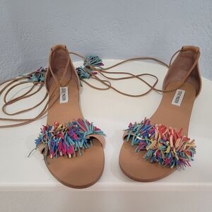 Steve Madden flat sandals.